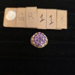 Item # GR118  14K Gold Purple stones in a disc shape ring size 8